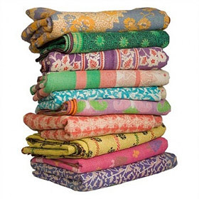 Pile of hand woven Kantha clothes