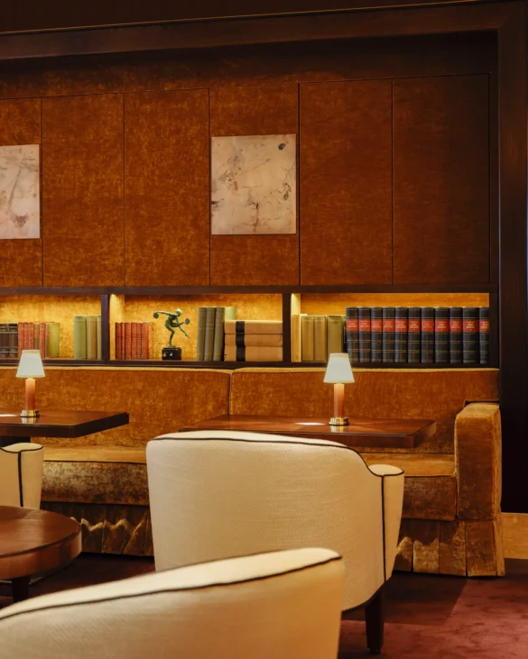 The Library at The Wilde Members Club, featuring cozy seating and curated book collections. Courtesy of The Wilde."